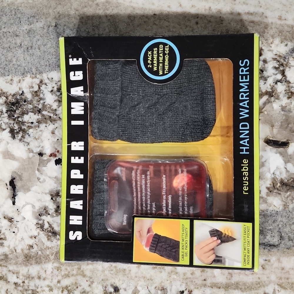 NWT Sharper Image reusable hand warmers
